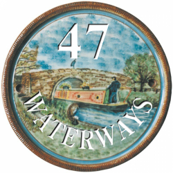 8 Inch Terracotta House Plaque with Boat and Bridge