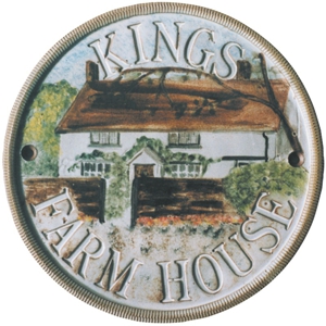 Terracotta plaque showing a farm house